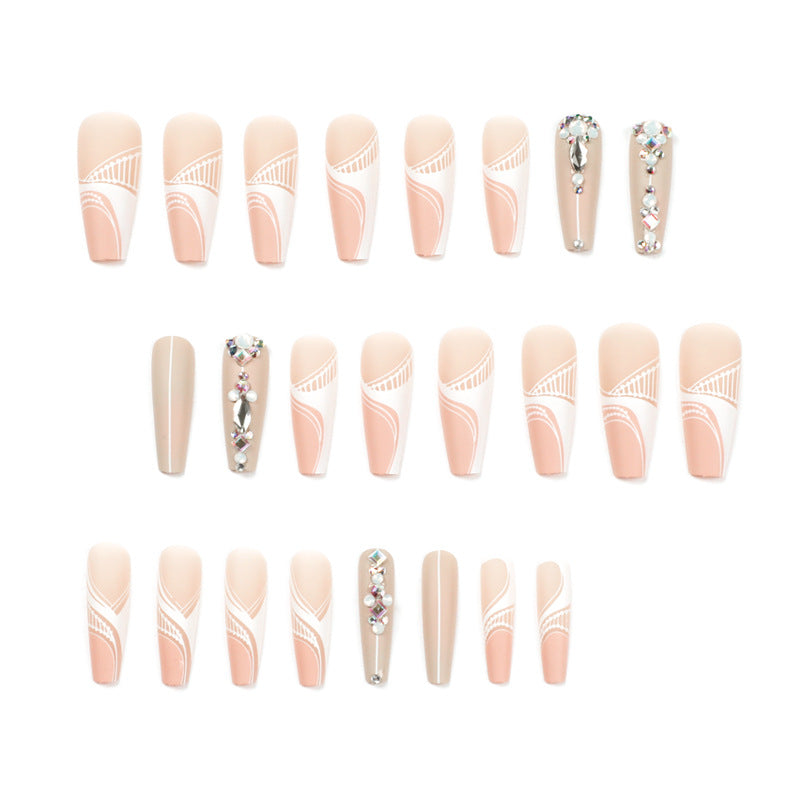 Artful nail extensions with elegant decorations Stornfield