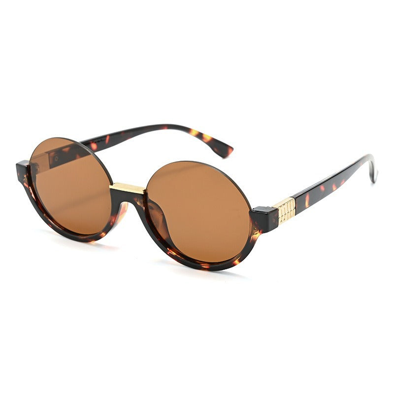 Women’s modern round sunglasses with elegant accents and UV protection Stornfield
