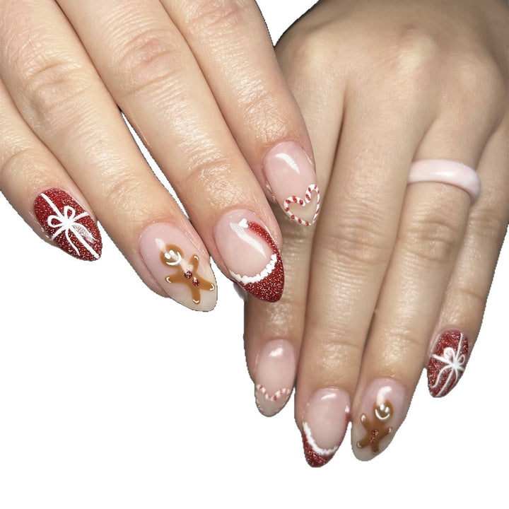 Artificial nail set with festive candy cane and gingerbread pattern Stornfield