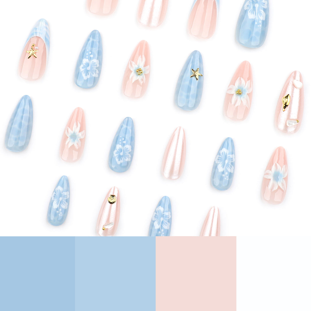 Artful nail extensions with delicate floral designs and glitter accents Stornfield