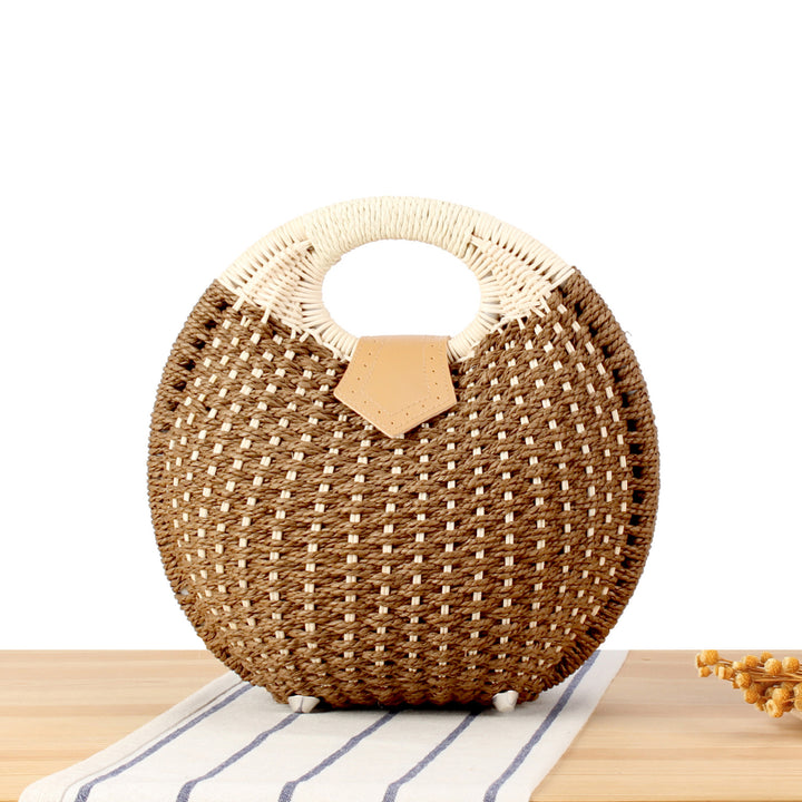 Round straw bag with elegant leather handle Stornfield