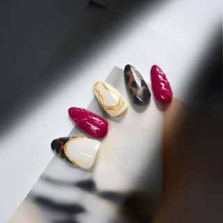 Decorative Stiletto Press-On Nail Set with Artistic Patterns Stornfield
