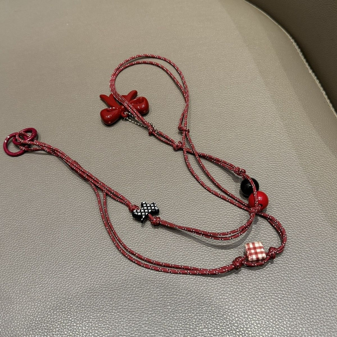Playful Bead Charm Eyewear Holder Stornfield