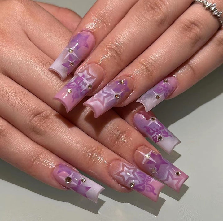 Artistic acrylic nails with modern glitter accents Stornfield