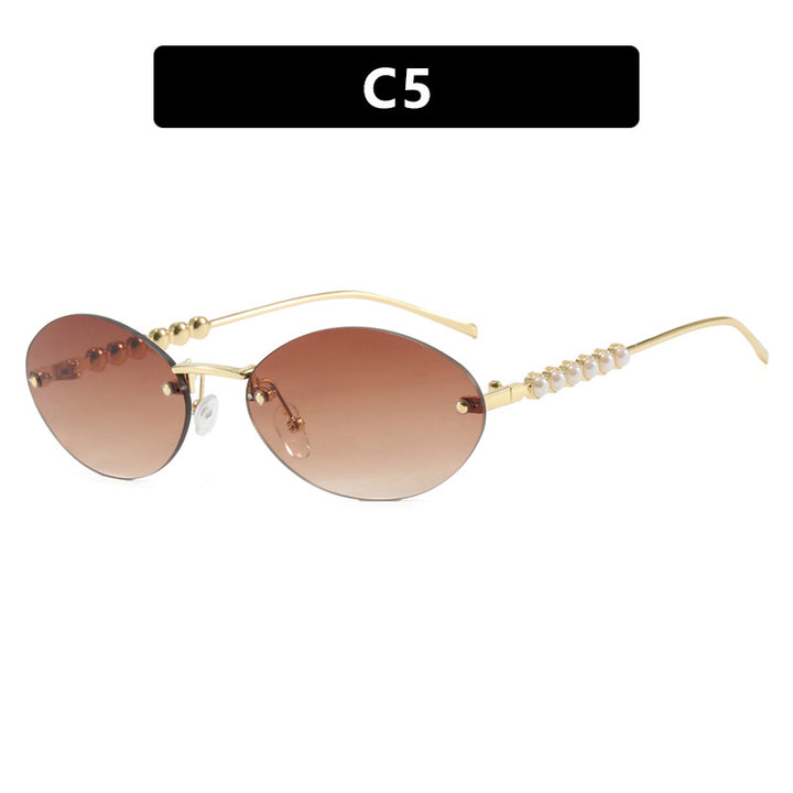 Women's stylish oval sunglasses with elegant embellishments Stornfield
