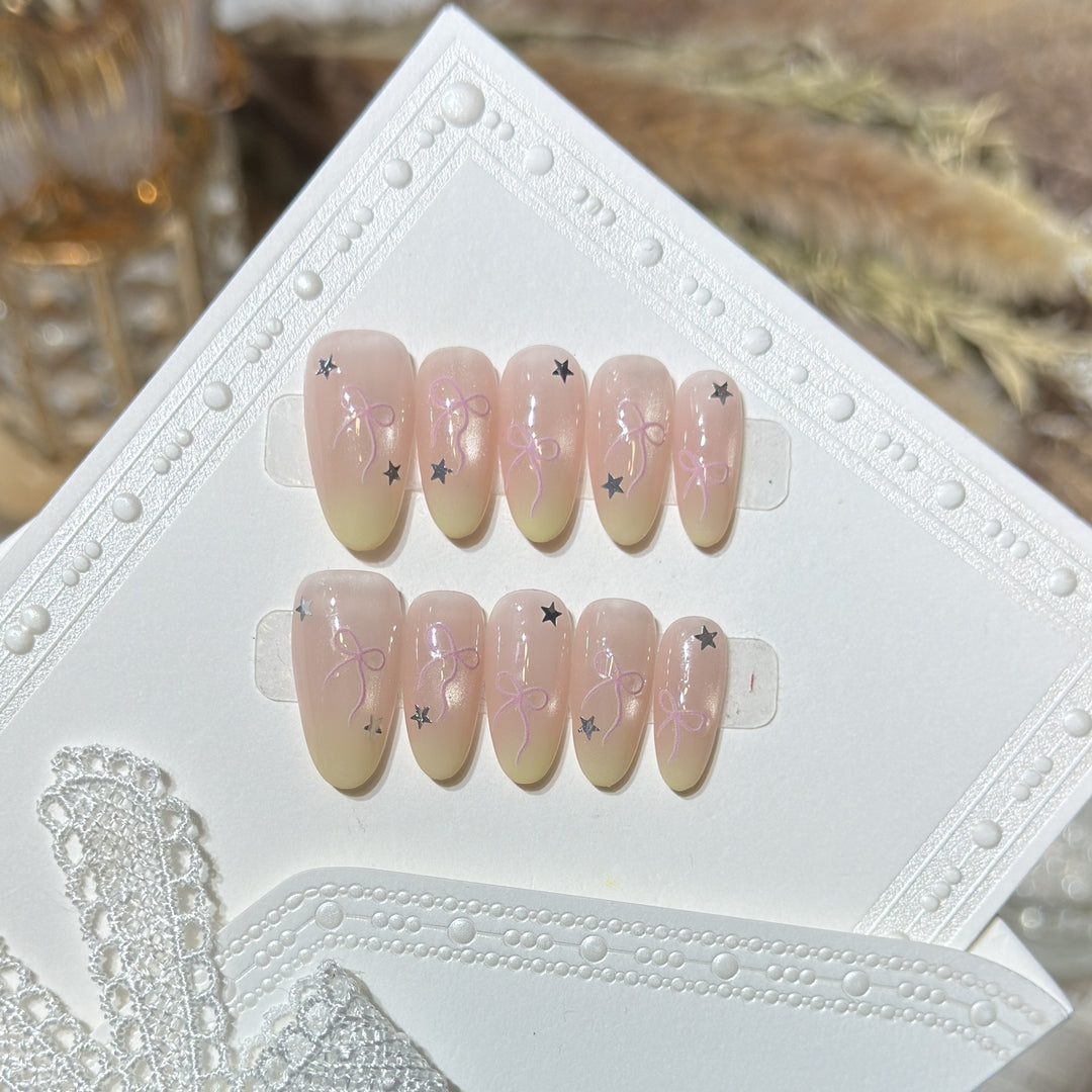 Press-On Nail Set with Bow and Star Accents Stornfield