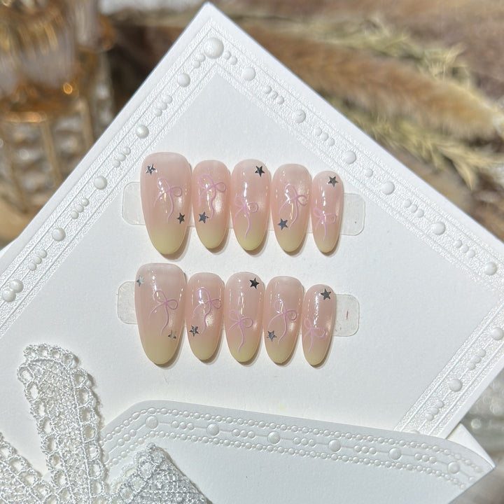 Press-On Nail Set with Bow and Star Accents Stornfield