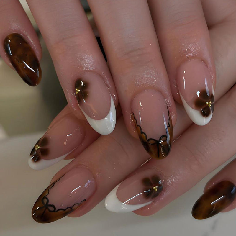 Artificial nail set with elegant spot design Stornfield