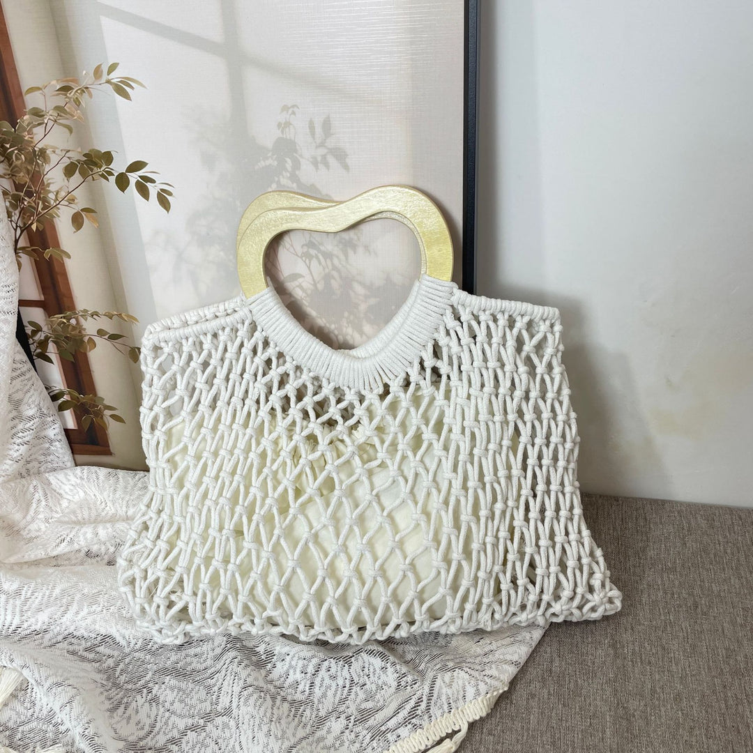 Stylish handbag with heart-shaped handle Stornfield