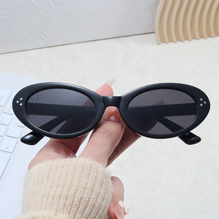 Ladies fashionable sunglasses in elegant oval design Stornfield