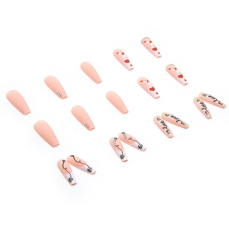 Acrylic nail set with romantic heart and glitter decorations Stornfield