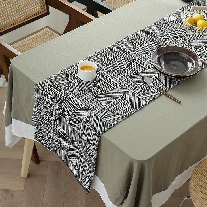 Woven table runner in graphic block stripe design with light cotton texture