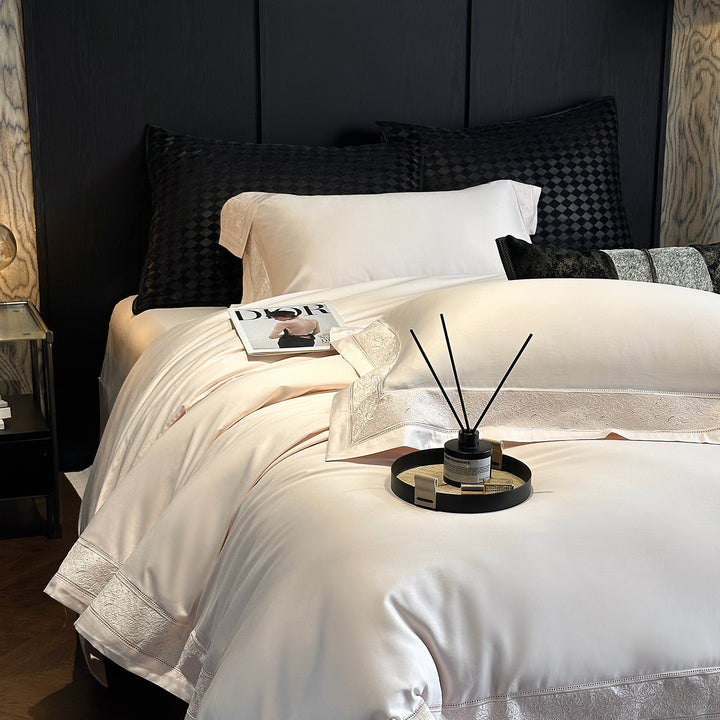 Premium cotton satin bedding set with integrated lace trim and delicate floral embroidery