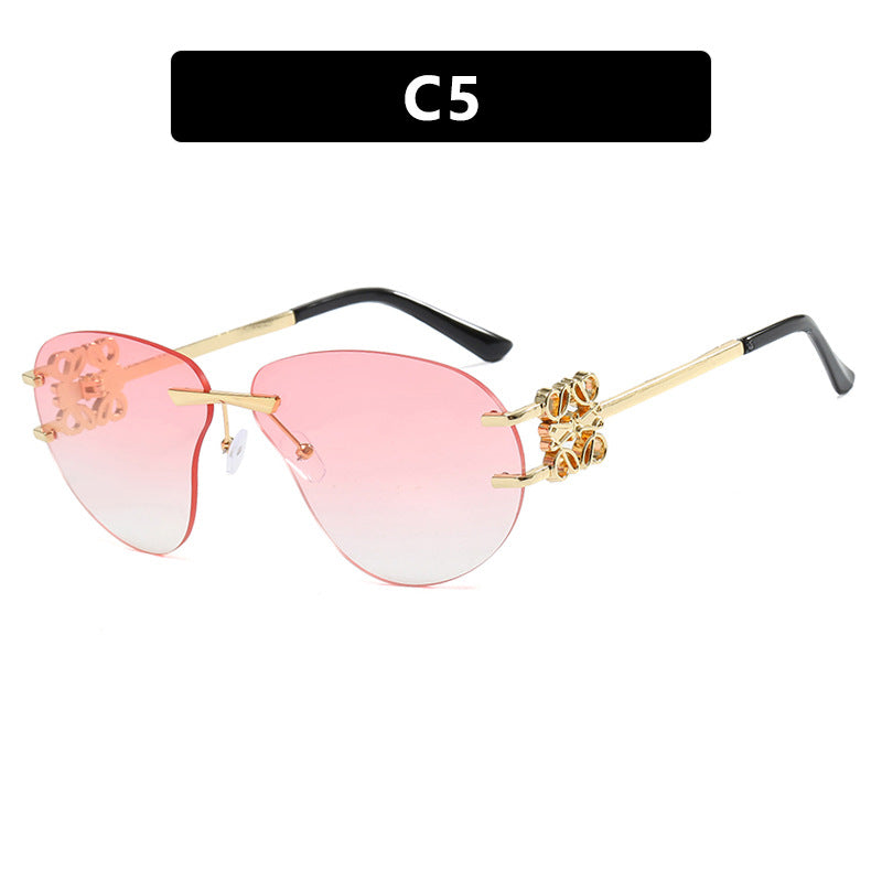 Women's fashionable sunglasses in elegant aviator style with gemstone details Stornfield