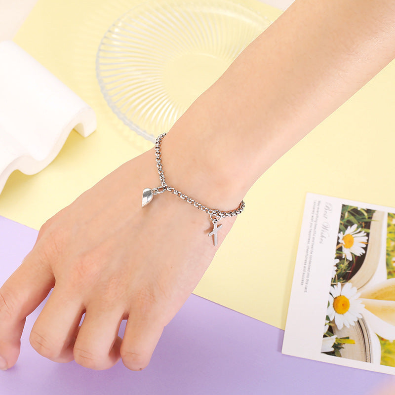 Versatile bracelet with cross and heart pendants Stornfield