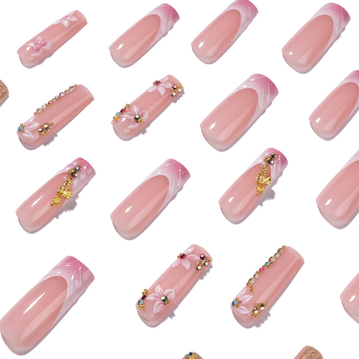 Artistic Nail Extensions with Rhinestone and Flower Embellishments Stornfield