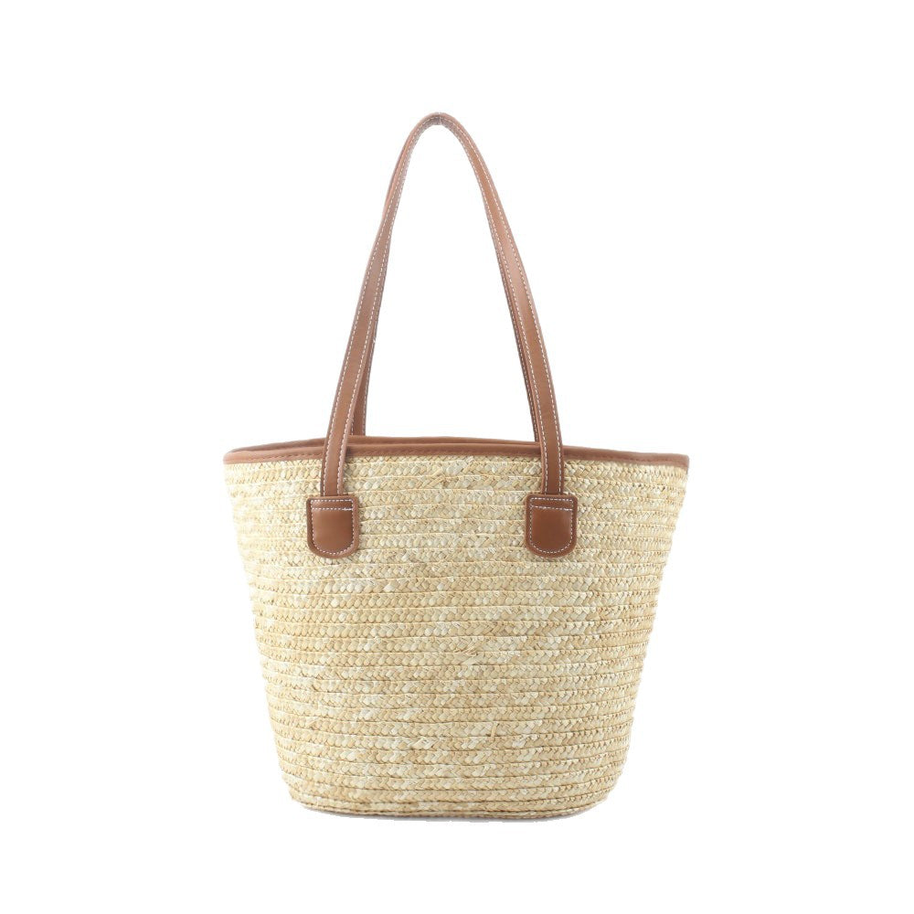 Braided basket bag with elegant leather handles Stornfield