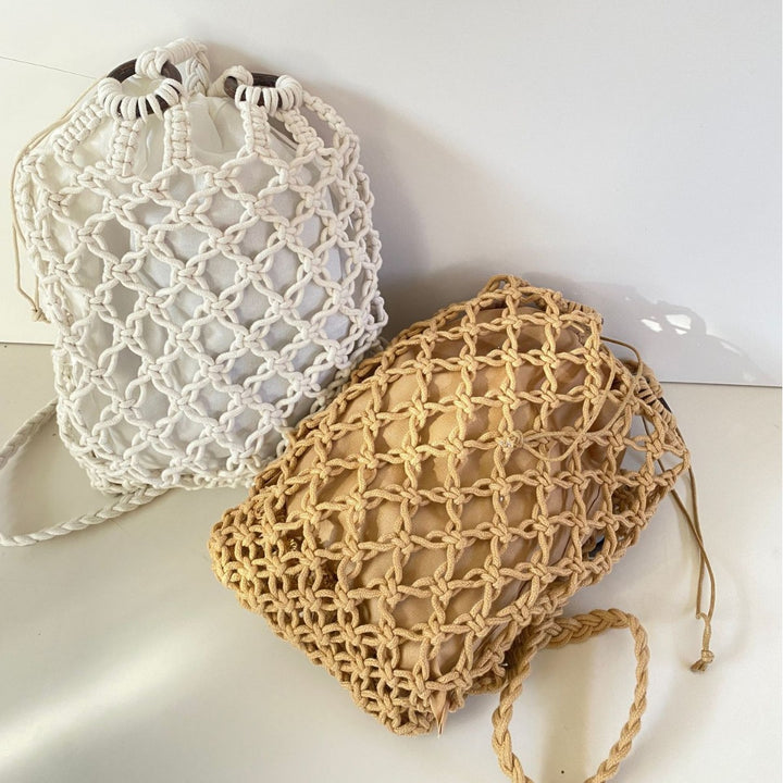 Hand-knotted mesh bag with decorative wooden rings Stornfield