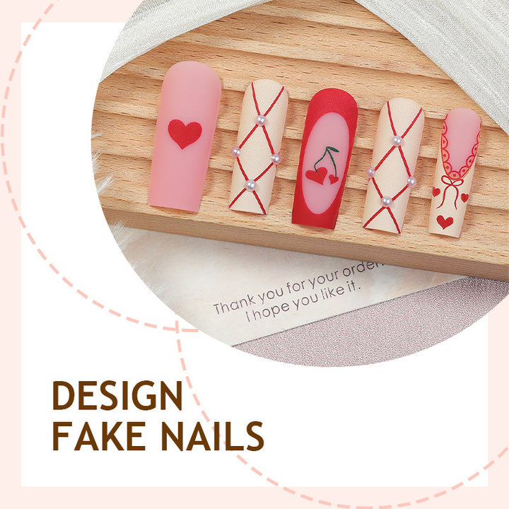 Art nail set with romantic heart and cherry motifs Stornfield