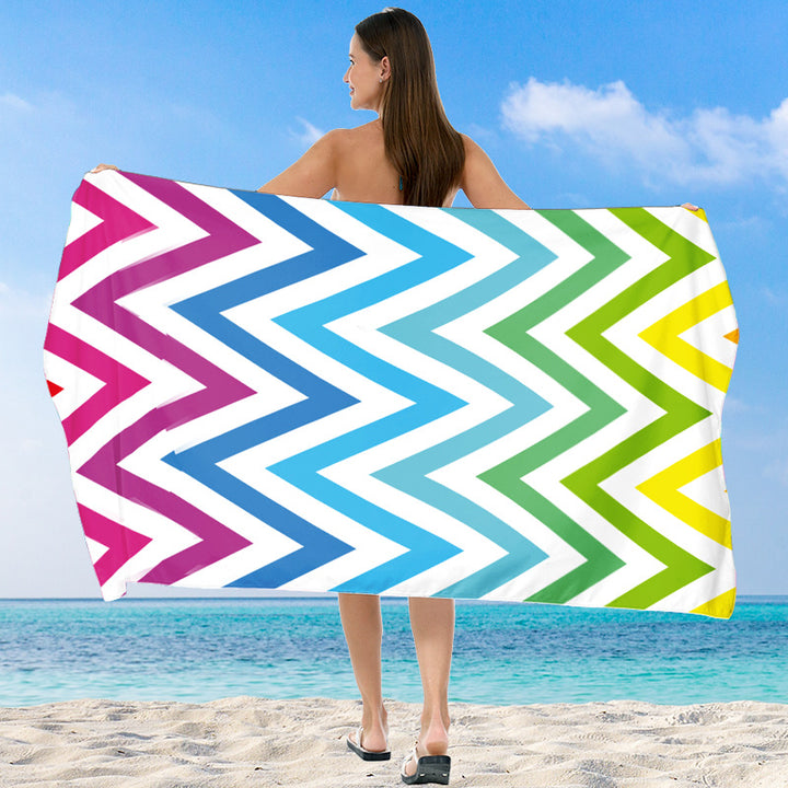 Beach towel with vibrant gradient color and stylish striped design Stornfield