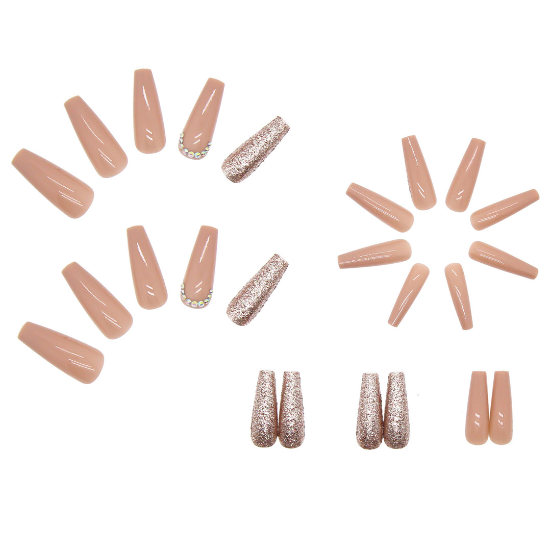 Glamorous artificial nail extensions with rhinestone and glitter details Stornfield