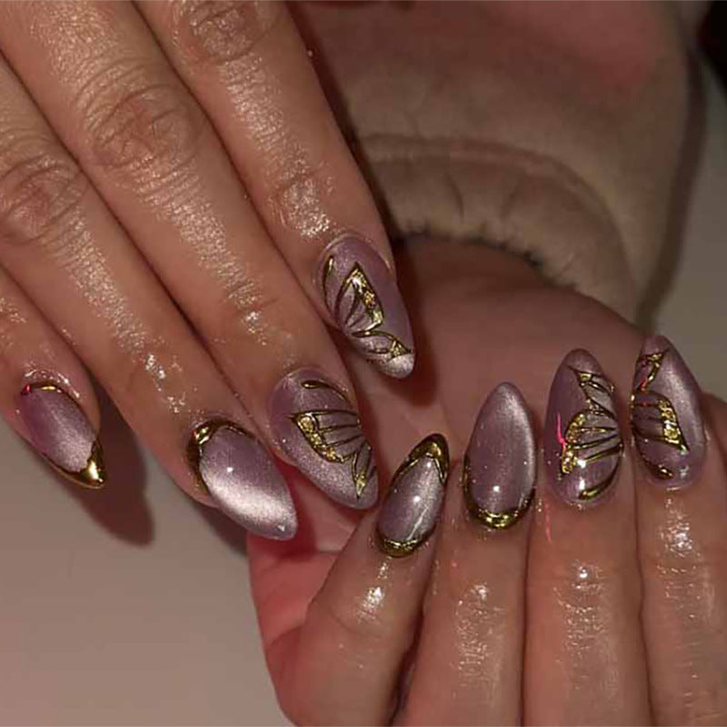 Artful Nail Extensions with Golden Accents Stornfield