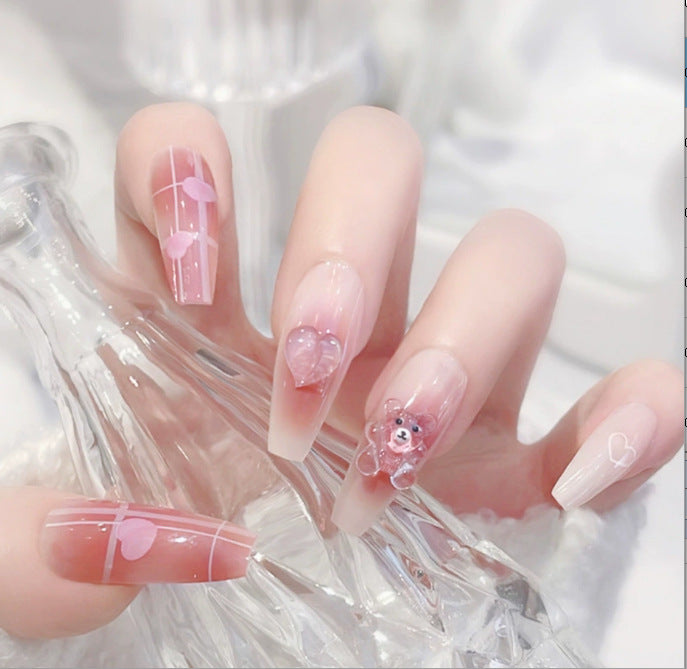 Glamorous nail art with pearls and glitter Stornfield