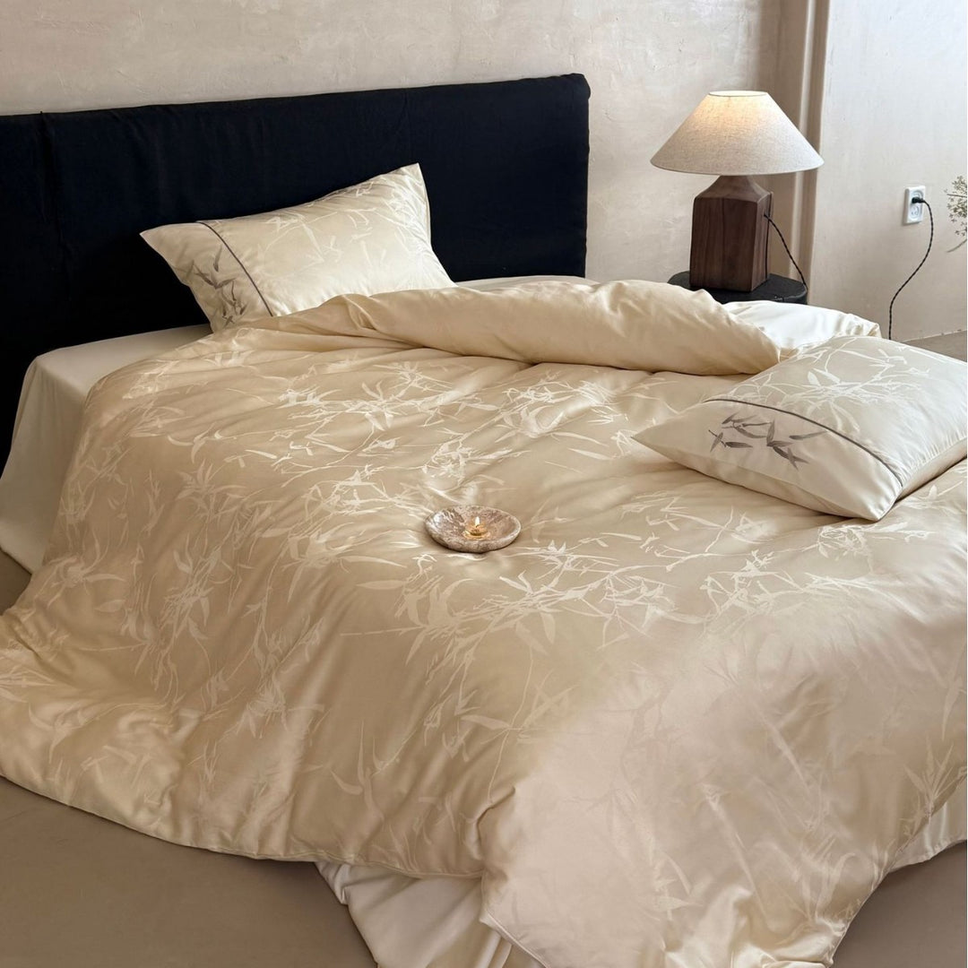 Premium Satin bedding set with subtle jacquard leaf pattern and silky finish