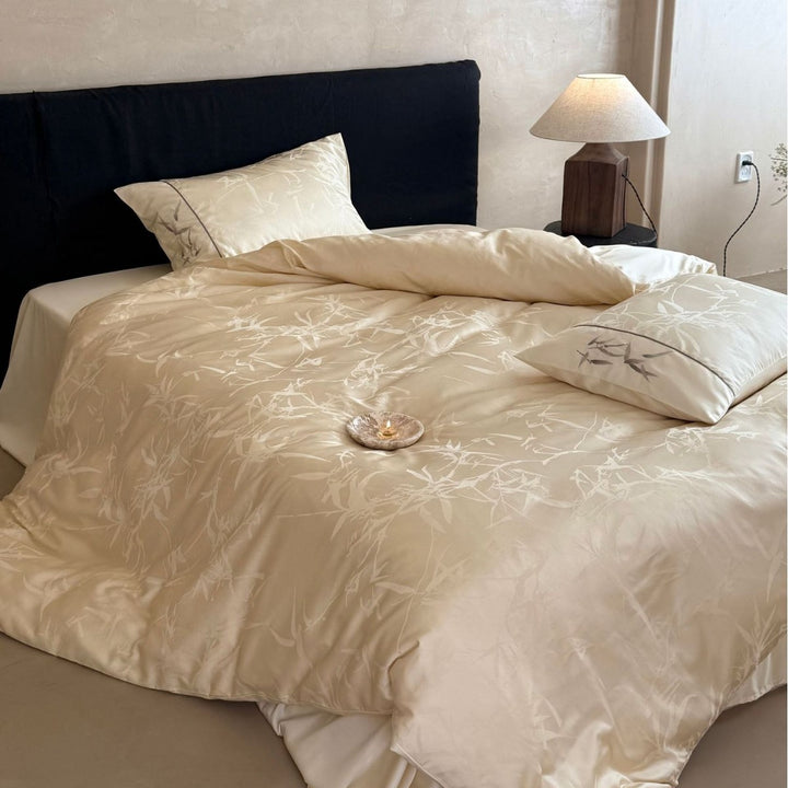 Premium Satin bedding set with subtle jacquard leaf pattern and silky finish
