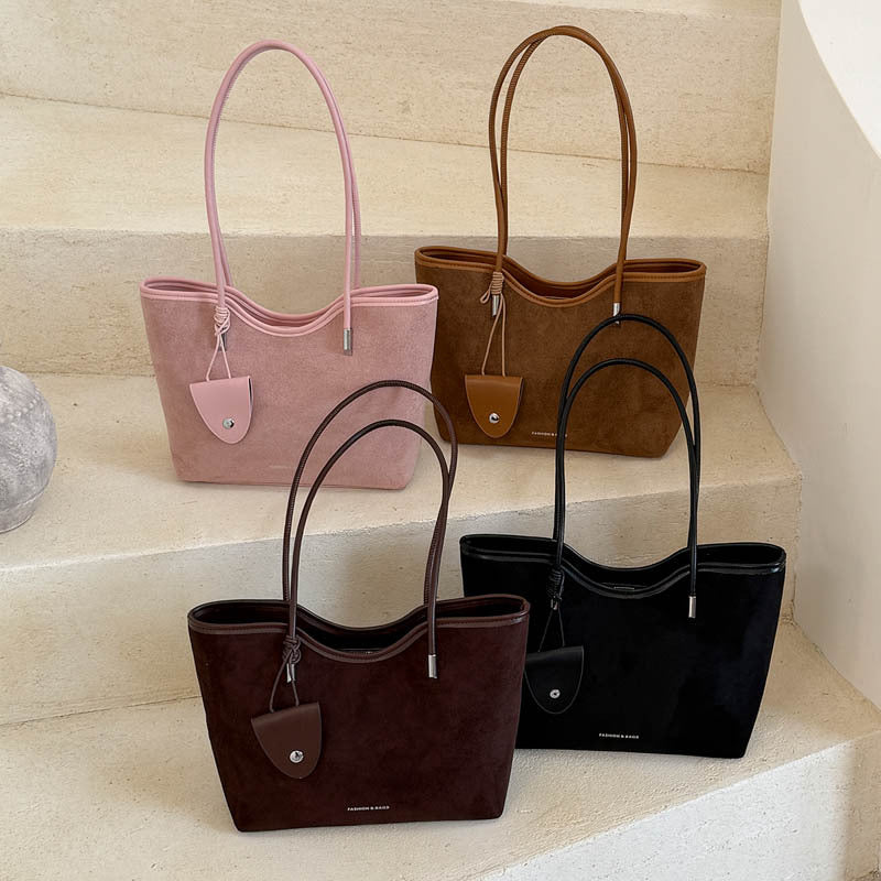 Chic Suede Tote with Decorative Pocket