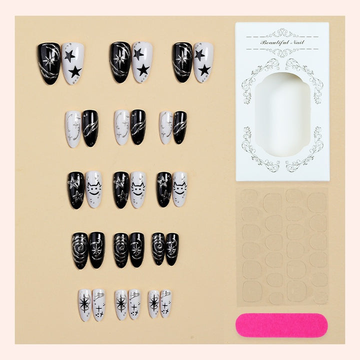 Nail art set with creative star motifs and sparkling accents Stornfield