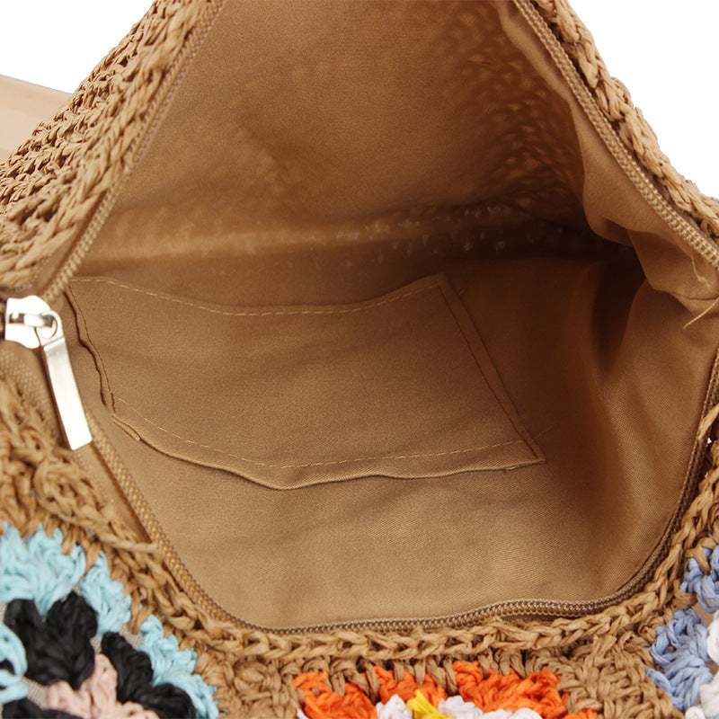 Hand-knotted shoulder bag with colorful floral pattern Stornfield