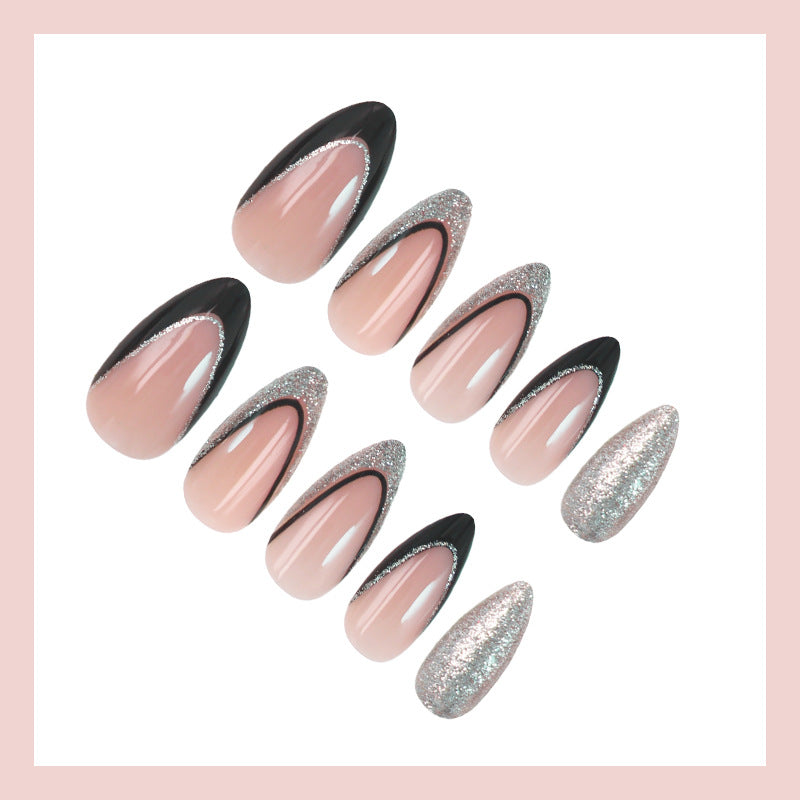 Artificial nail set with glamorous glitter accents and elegant black Stornfield