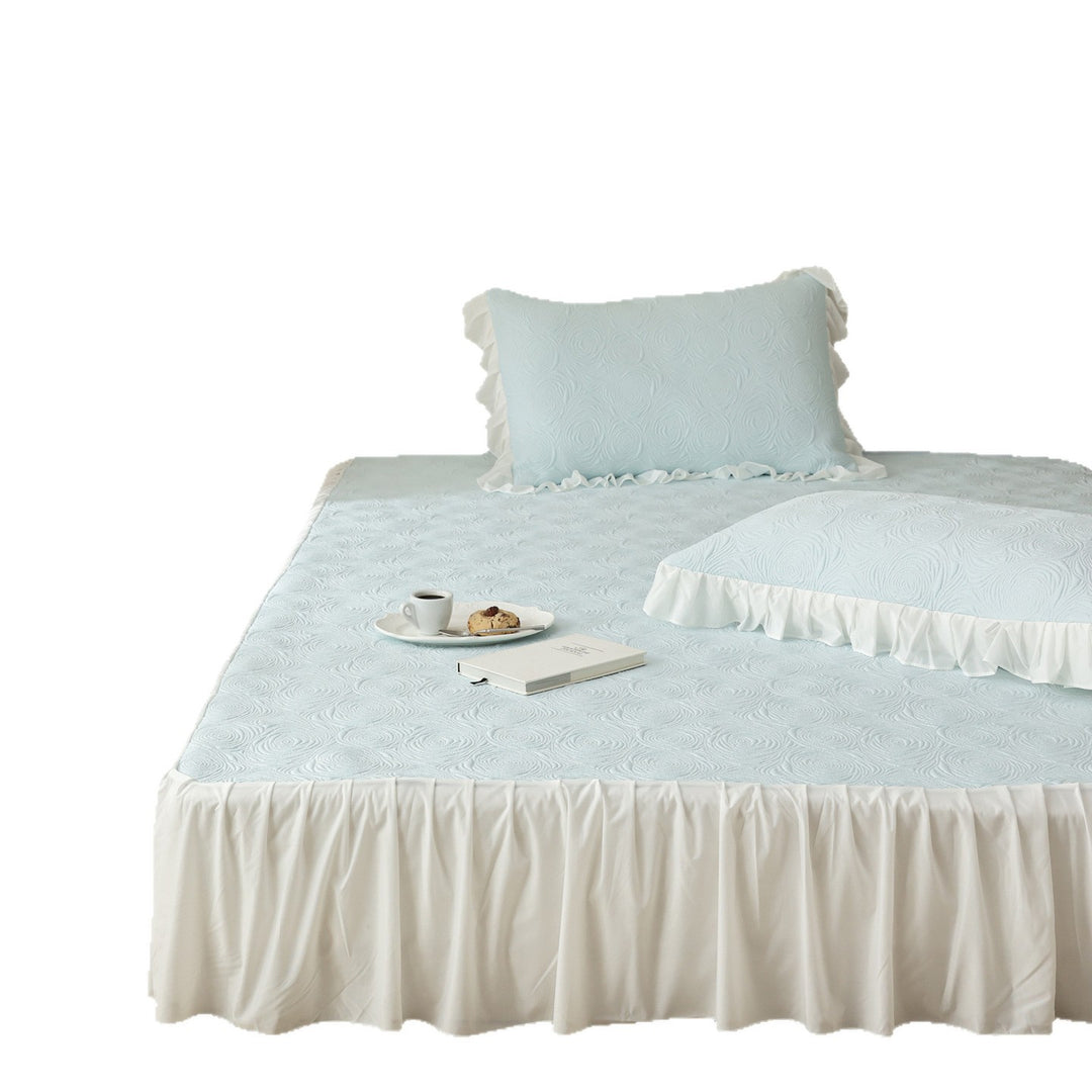 Bedding set with quilted mattress topper and ruffled skirt