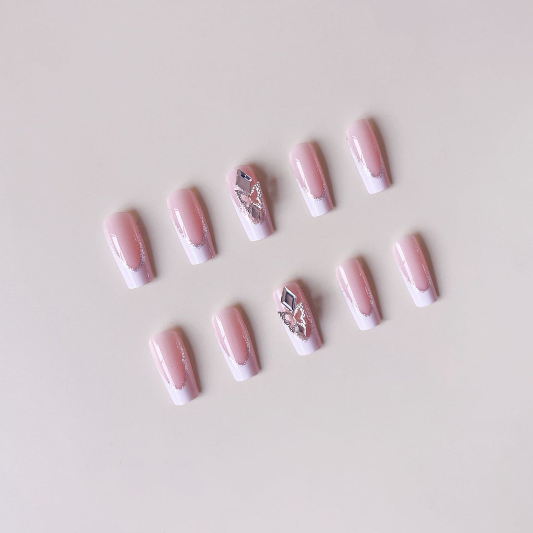 Acrylic nail set with elegant rhinestone and modern tip decorations Stornfield