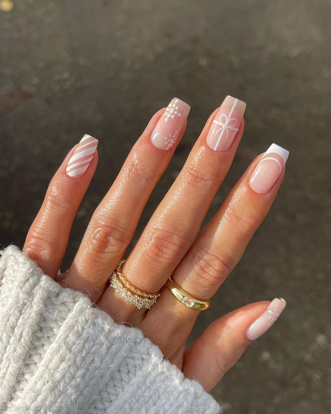 Artistic Winter-Themed Nail Art Stornfield