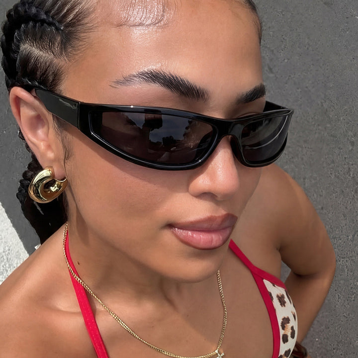 Women's sporty sunglasses with flat, aerodynamic design and UV protection Stornfield