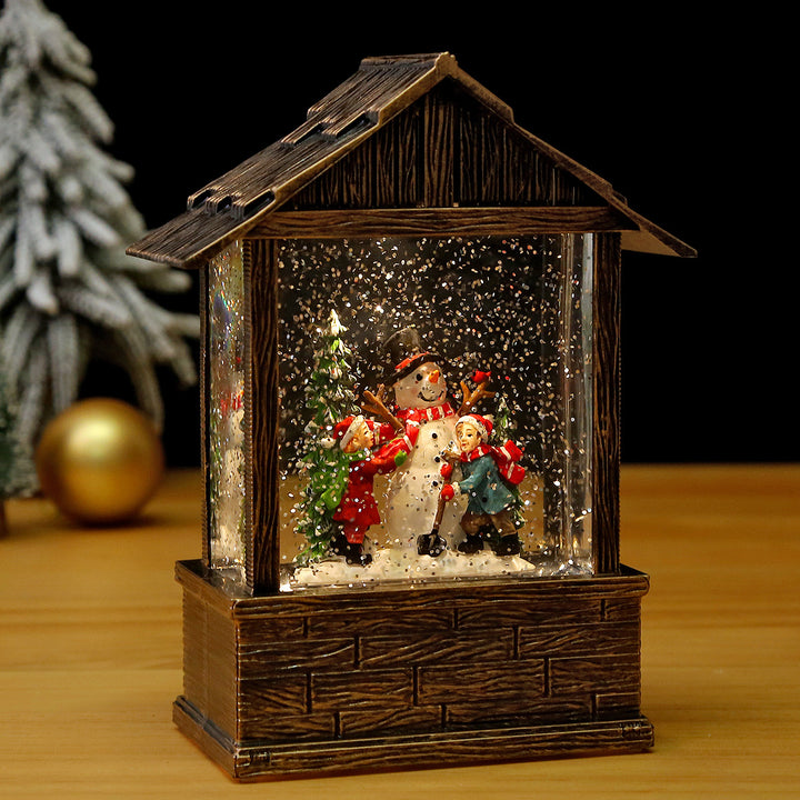 Nostalgic snow globe decoration with Santa Claus and children Stornfield