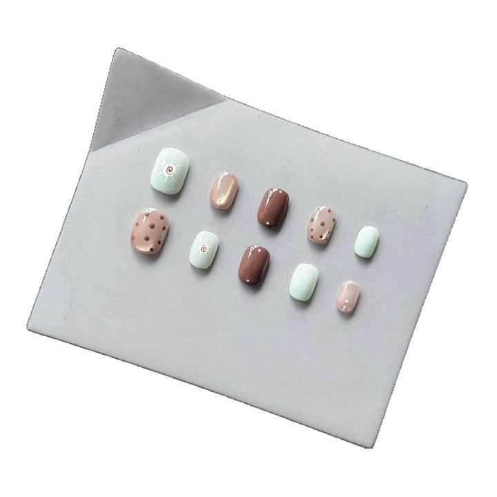 Decorative Press-On Nail Set with Unique Artistic Designs