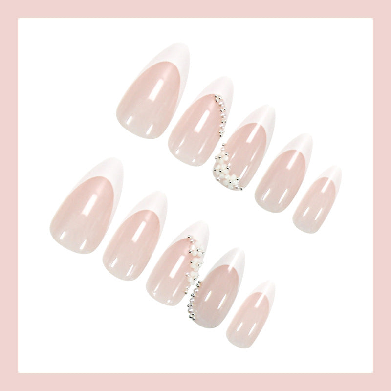Artificial nail set with romantic flower and glitter embellishments Stornfield