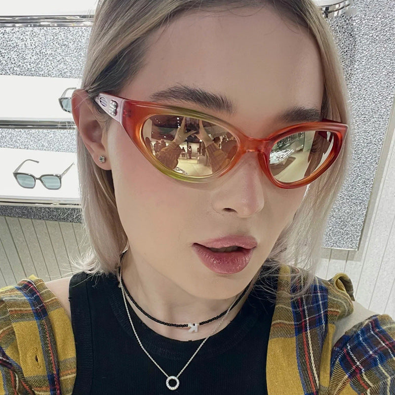 Ladies extravagant sunglasses with curved design Stornfield