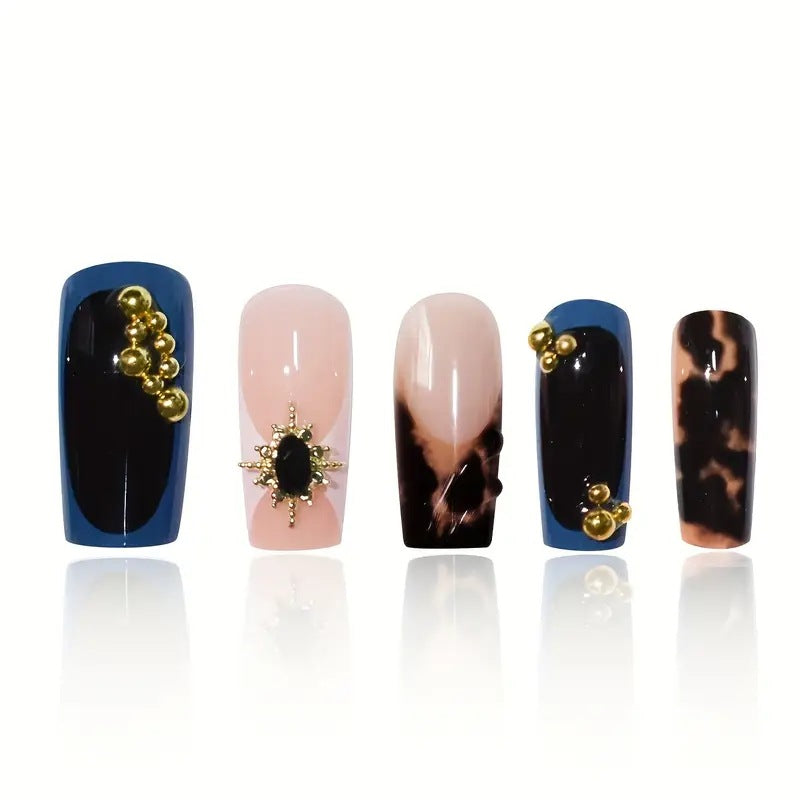 Artistic Patterned Press-On Nail Set with Decorative Elements Stornfield