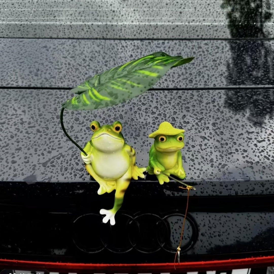 Funny frog figure with umbrella Stornfield