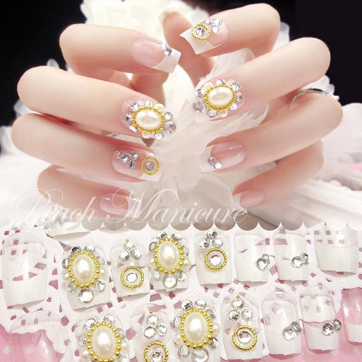 Artificial nails with elegant flower and rhinestone design Stornfield