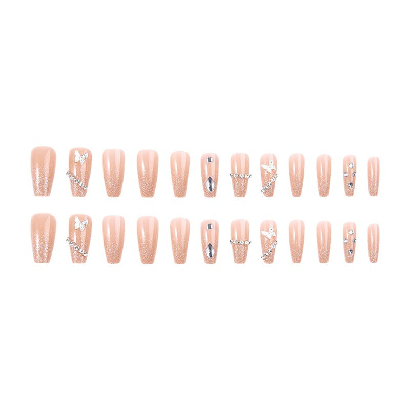 Glamorous artificial nails with sparkling rhinestones and elegant designs Stornfield