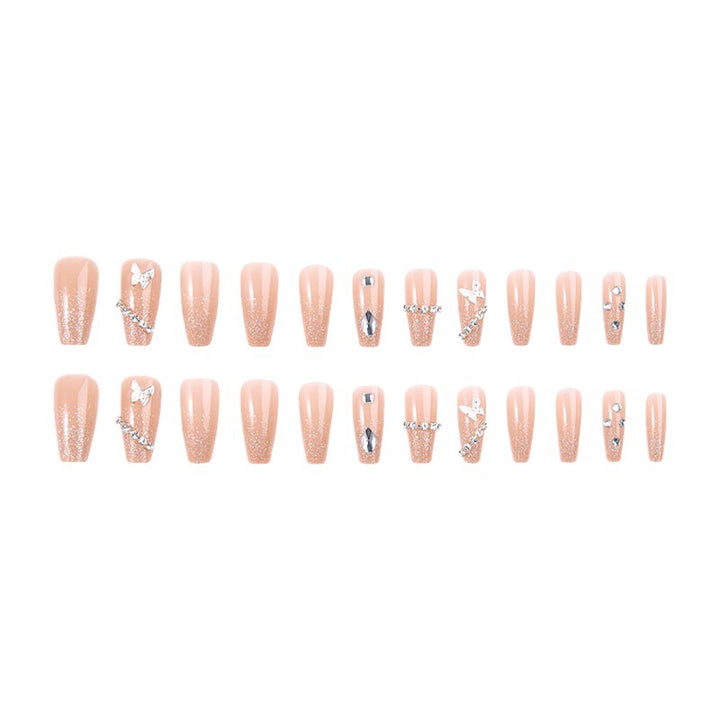 Glamorous artificial nails with sparkling rhinestones and elegant designs Stornfield