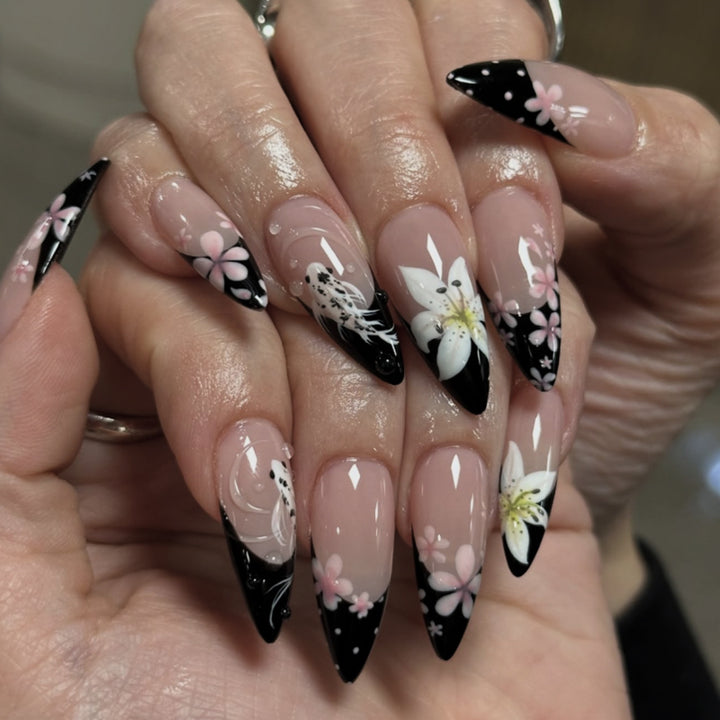 Glamorous stiletto nails with elegant star design Stornfield