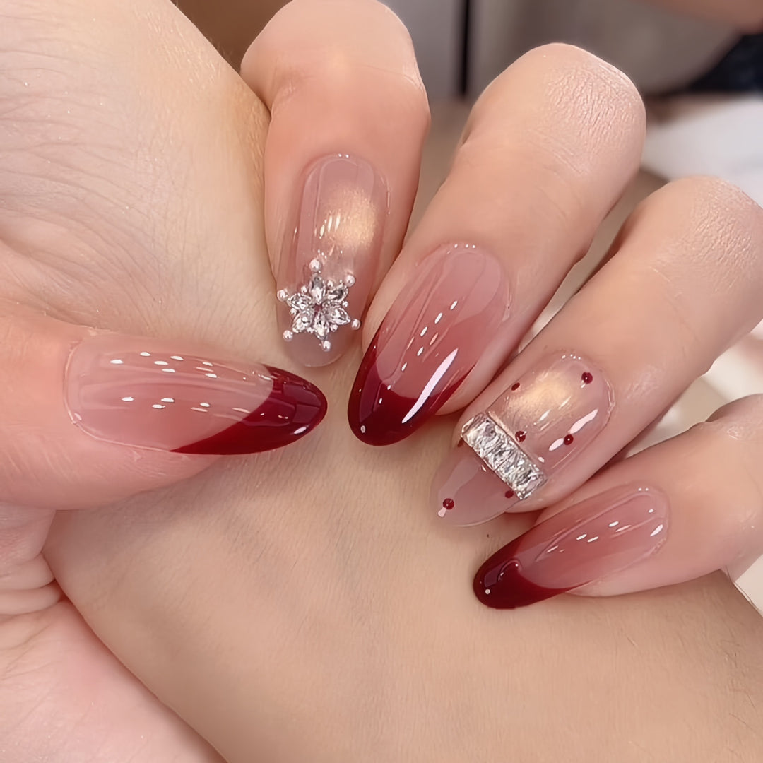 Artificial nails with festive design and rhinestone details Stornfield