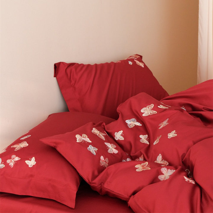 Embroidered bedding set made of cotton satin with butterfly appliqué