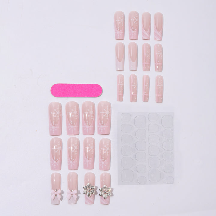 Creative nail art set with filigree snowflake and bow decorations Stornfield
